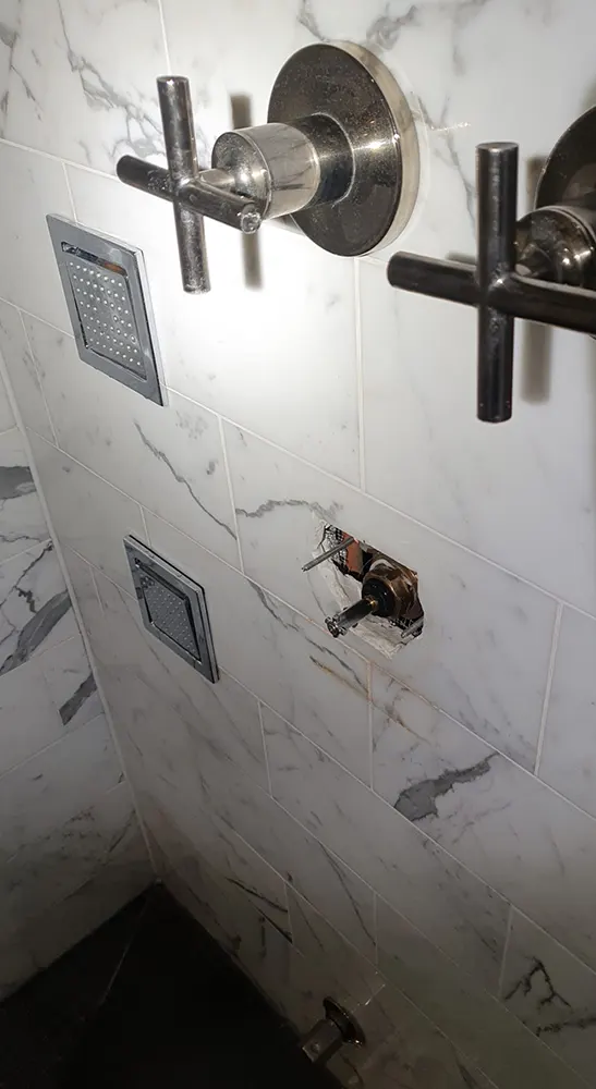 Shower Leak with Faucets and Plumbing Rescue Plumbing
