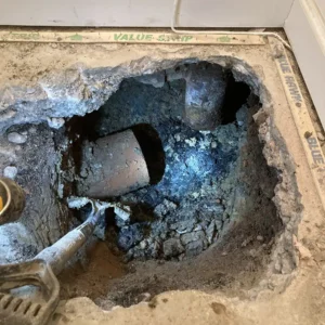 Mud coming from broken drains