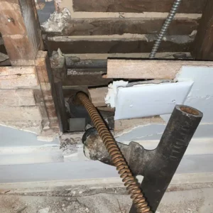 Use bucket to remove standing water