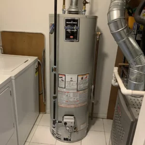 Gas water heater attached to hot water pipes