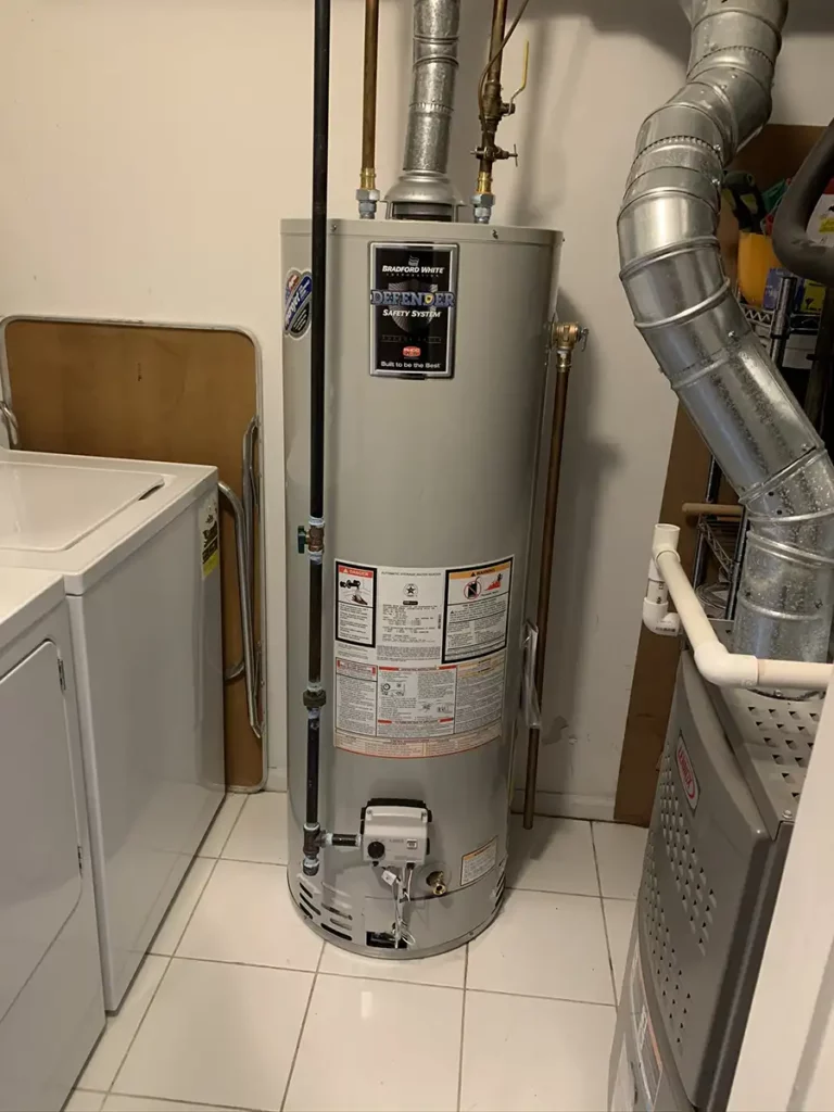 gas water heater attached to hot water pipes