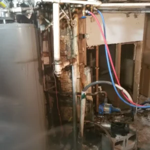 Replacing water heater and repairing water leaks