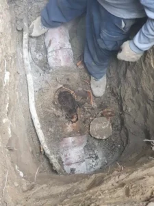 raw sewage spilling from main sewer line