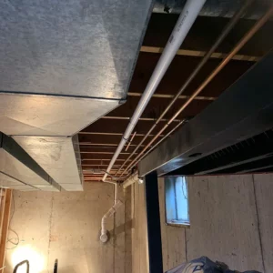 Basement with overhead system