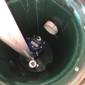 sewage ejector pumps in basement of Lincolnwood, Illinois house