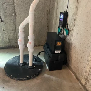 sewage ejector pumps in basement of Lincolnwood, Illinois house