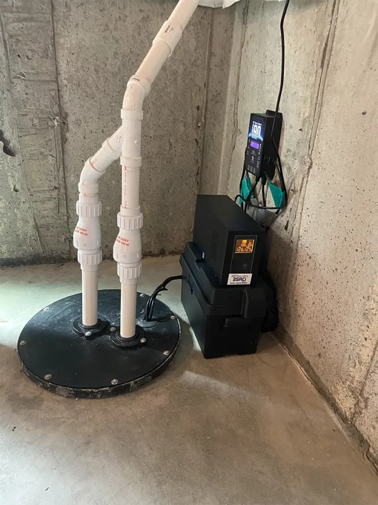 sewage ejector pumps in basement of Lincolnwood, Illinois house