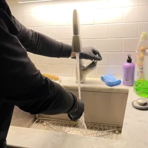 Rescue Plumber tests tap water in Chicago