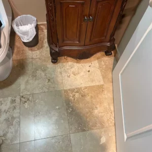 water damage in bathroom cabinet