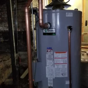 Plumbers locate the water heater near the sewer lines
