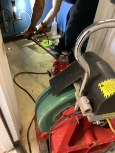 Professional drain machine used in bathroom to discover toilet clog