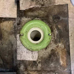 Toilet fully removed during services to reveal drains and solve issue