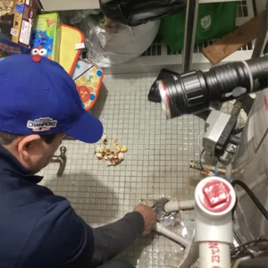 Illinois plumbing fixing clogged drain and providing cleaning services