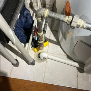 pipe system in utility basement before repair in chicago