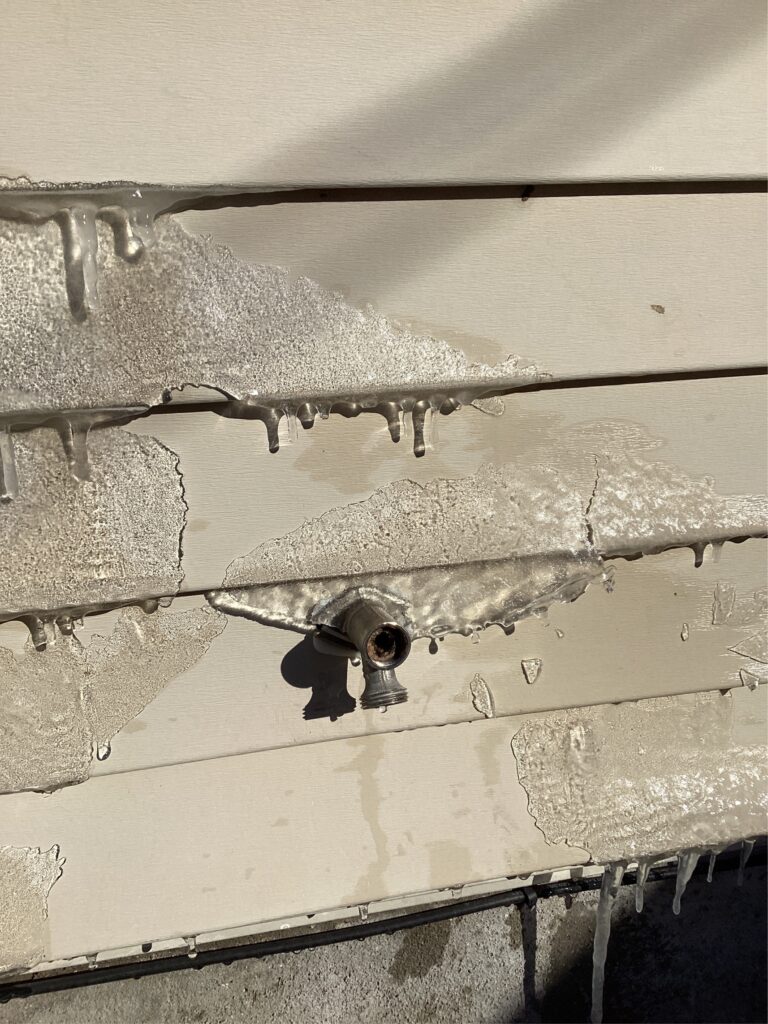 Water freezes near outside faucet when temperatures drop