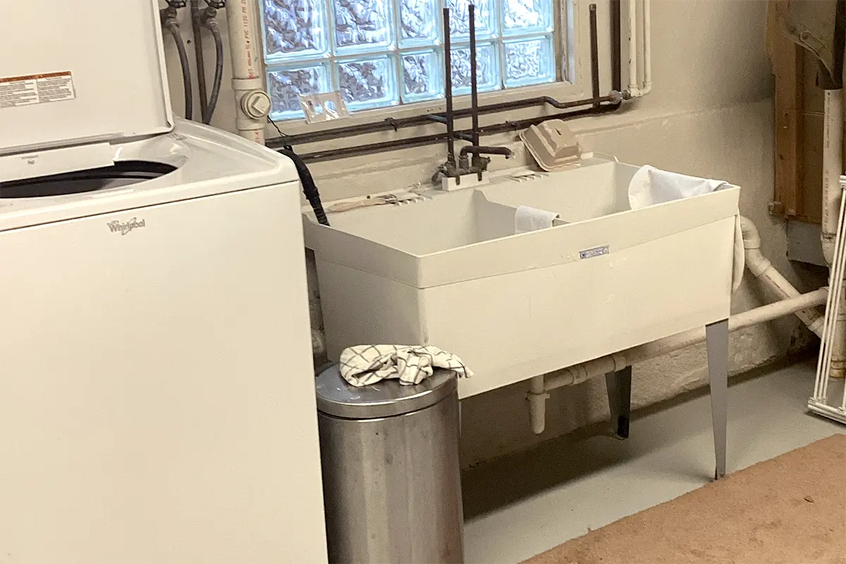 Clogged laundry sink drain cleaning