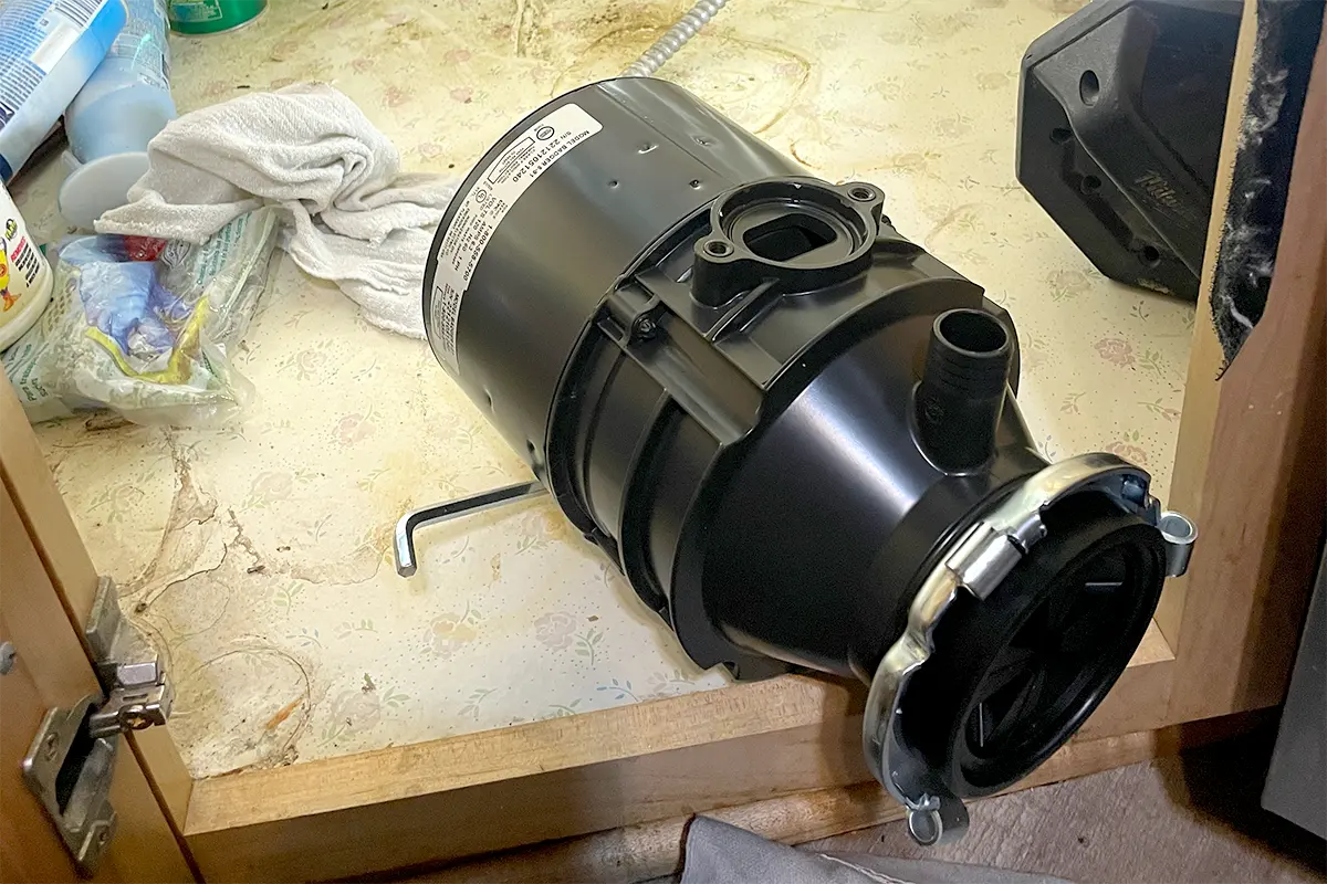 Garbage disposal clog drain cleaning