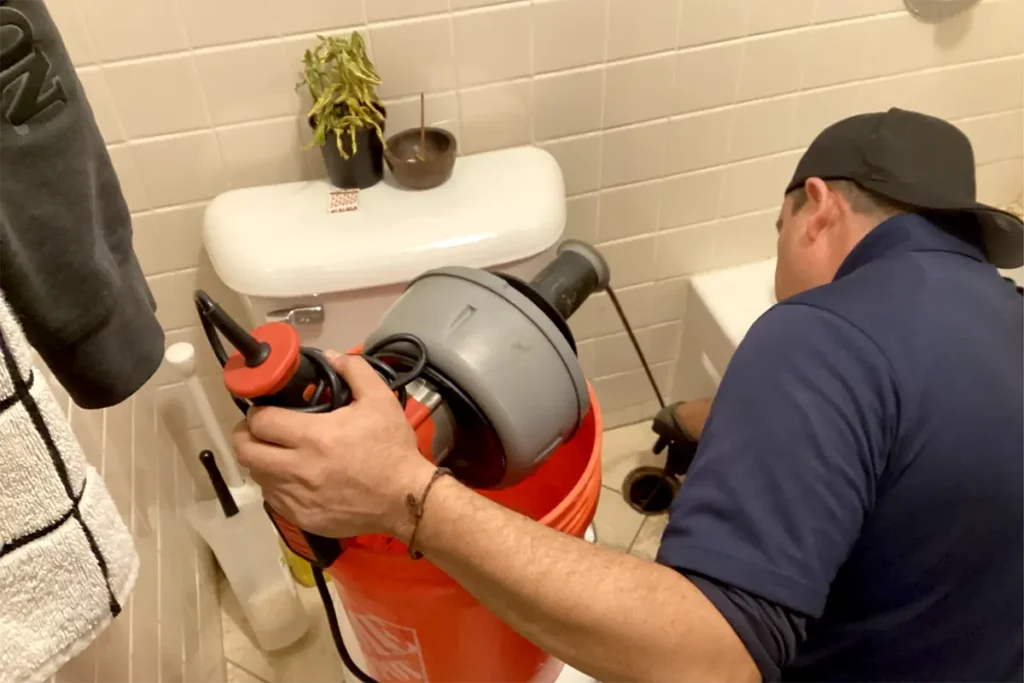 certified plumbers conducting drain inspection services in chicago