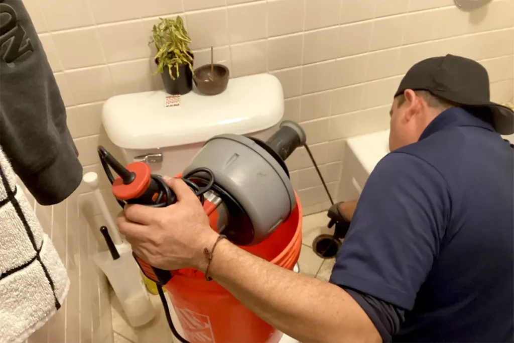 Certified plumbers conducting drain inspection services in chicago