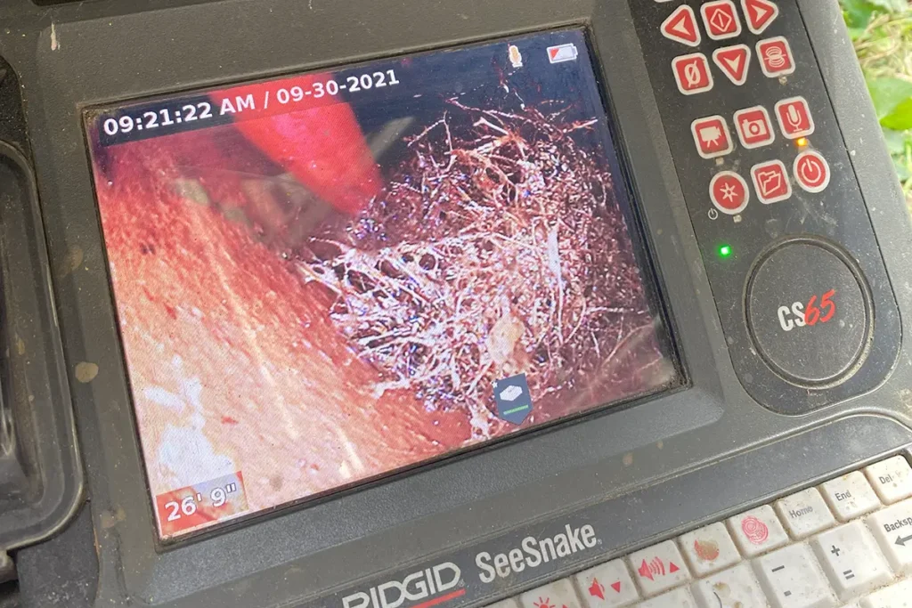 Sewer video camera inspecting plumbing system and sewer lines