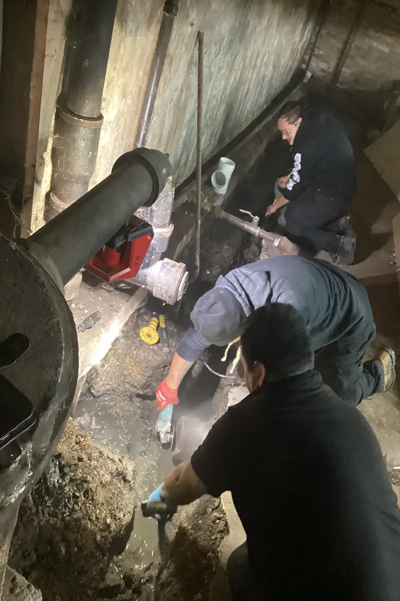 water management crew inspecting main sewer line