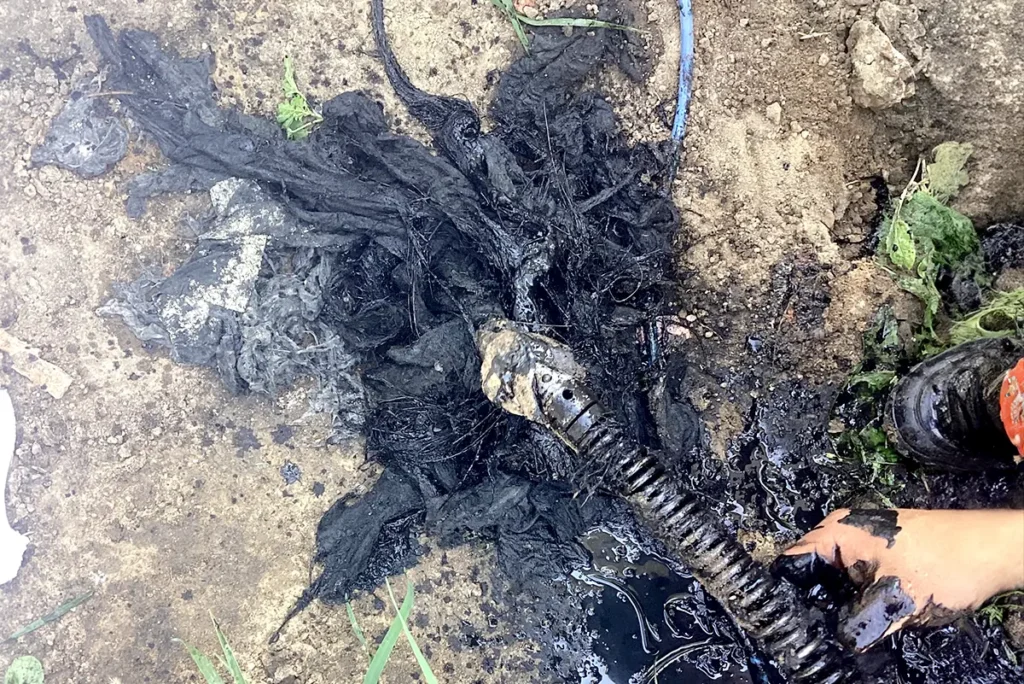 Drain cleaning of clogged sewer