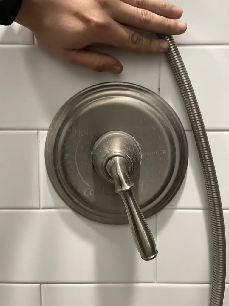 single handle shower system in bathroom