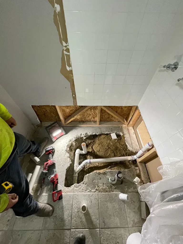Plumber installed drain pipes for new shower