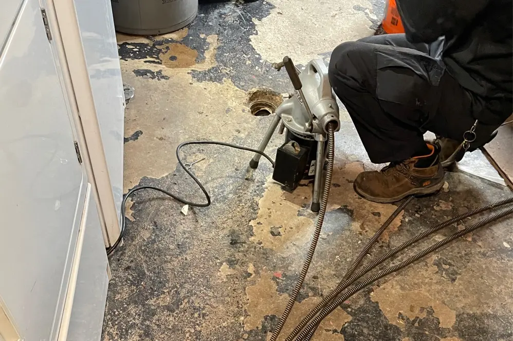 Drain cleaning a floor drain