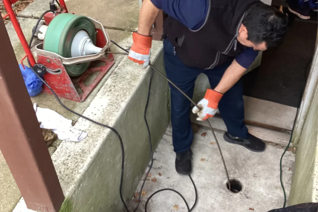 Plumber drain cleaning