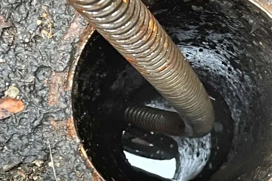 Drain cleaning open drain
