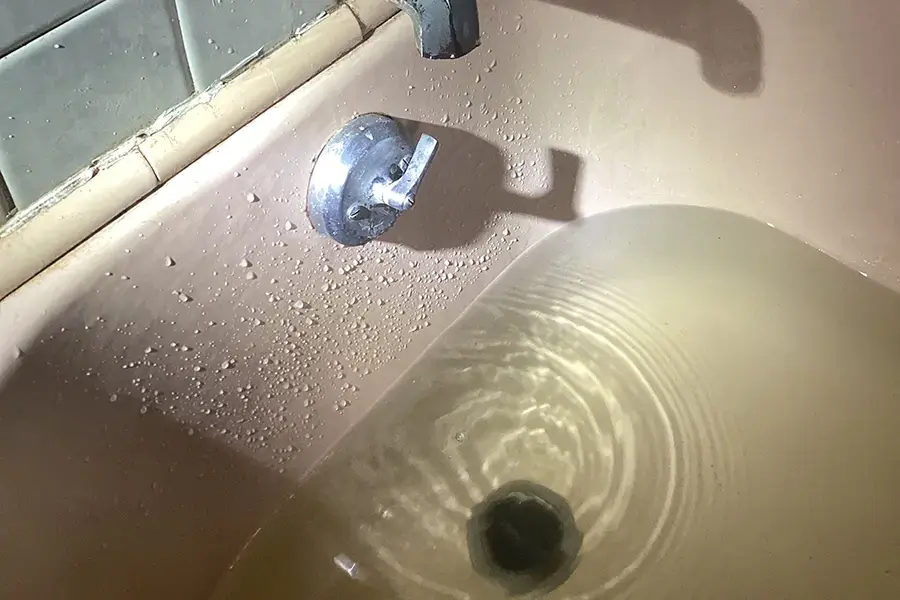 Water backup in bathtub