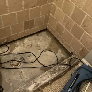 Shower floor removal to address bursting pipe