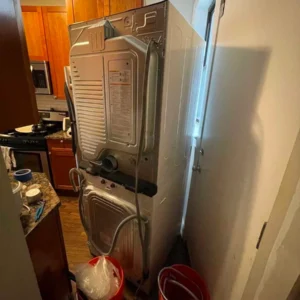 Washer and dryer, containment setup