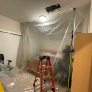 Setting up containment to begin the restoration process.