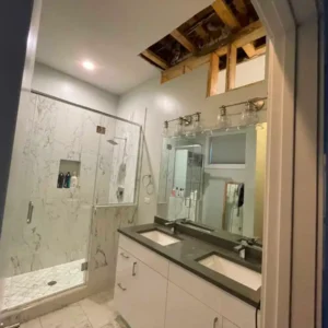 Bathroom ceiling after dehumidifiers and advanced equipment dried the affected area.